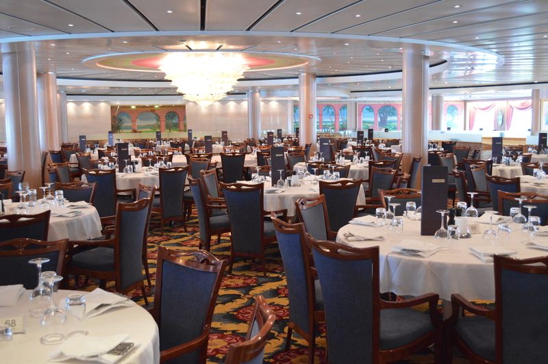 Cruise ship dining room with round tables